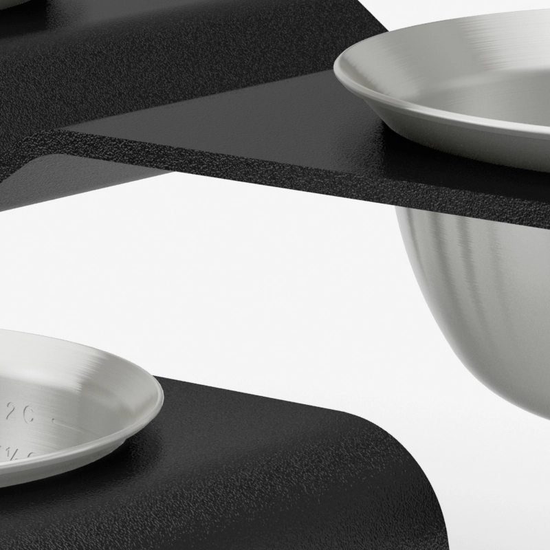 A close-up preview render of two Subwoofer dog bowls.